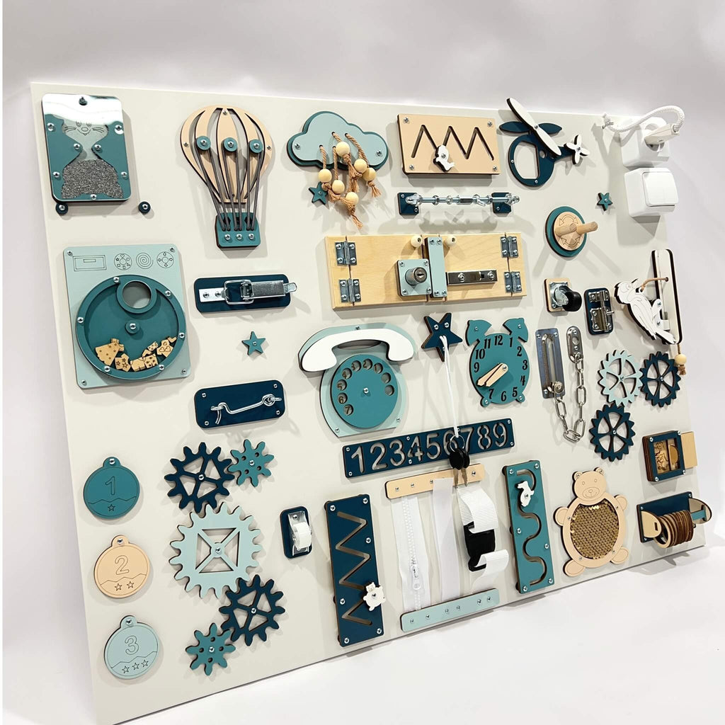 5. Studio shot of BusyBunnyToys extra large Montessori busy board with teal and natural wood activities, promoting toddler development.