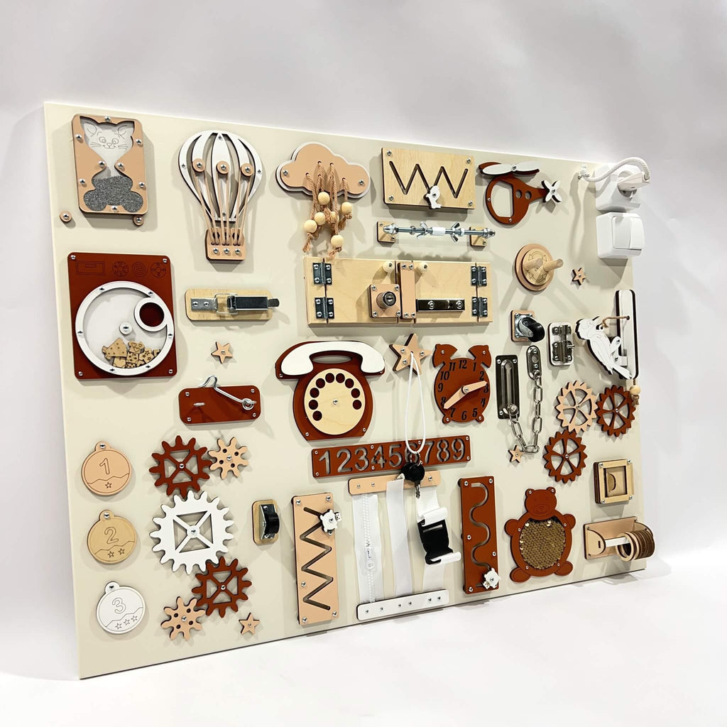 2. Studio shot of BusyBunnyToys extra large Montessori busy board with diverse activities in natural wood and red tones, designed for toddlers.