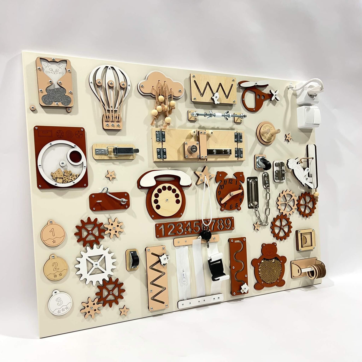 2. Studio shot of BusyBunnyToys extra large Montessori busy board with diverse activities in natural wood and red tones, designed for toddlers.