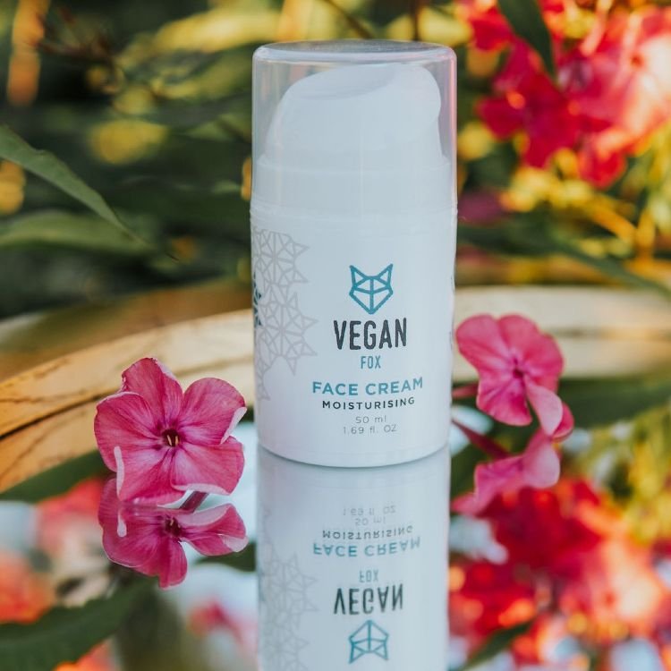 1. Vegan Fox Moisturising Face Cream 50 ml with pink flowers in outdoor setting