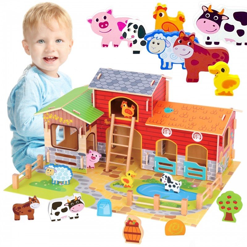 1. Smiling child with Woopie Green Mega Farm set, featuring barn, stable, and colorful animal figurines