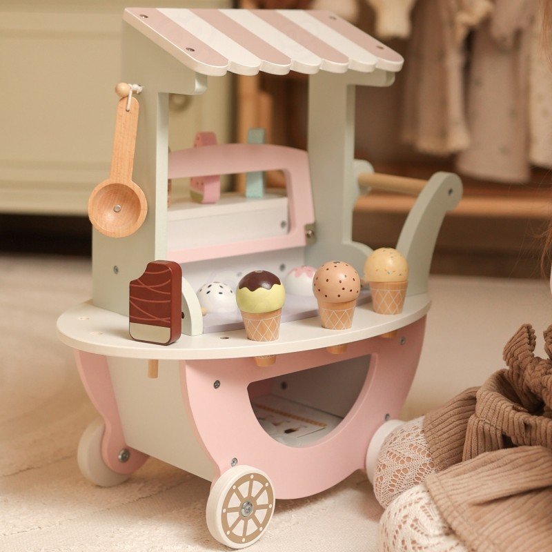 2. Pastel wooden ice cream cart with magnetic scoops and popsicles on a playroom floor