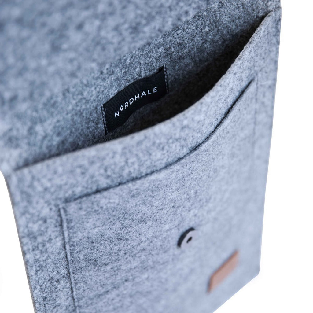 4. Close-up of Nordhale Malmö 13' Grey Laptop Sleeve showing front pocket and brand label