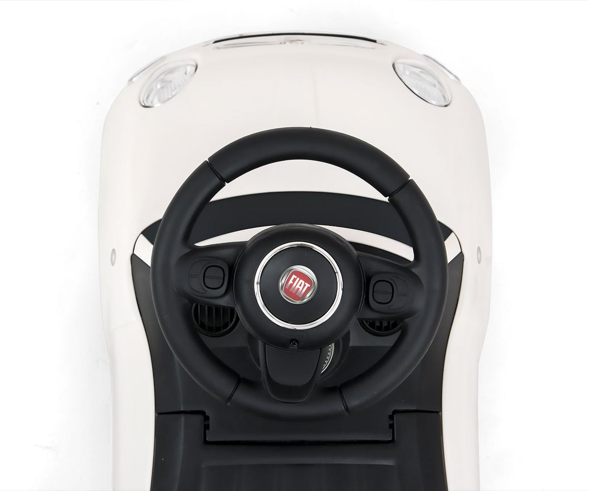 3. Top view of black steering wheel with Fiat logo on white Milly Mally ride-on Fiat 500