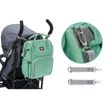 2. Mint green Fillikid diaper backpack attached to a stroller with close-up of clip and straps