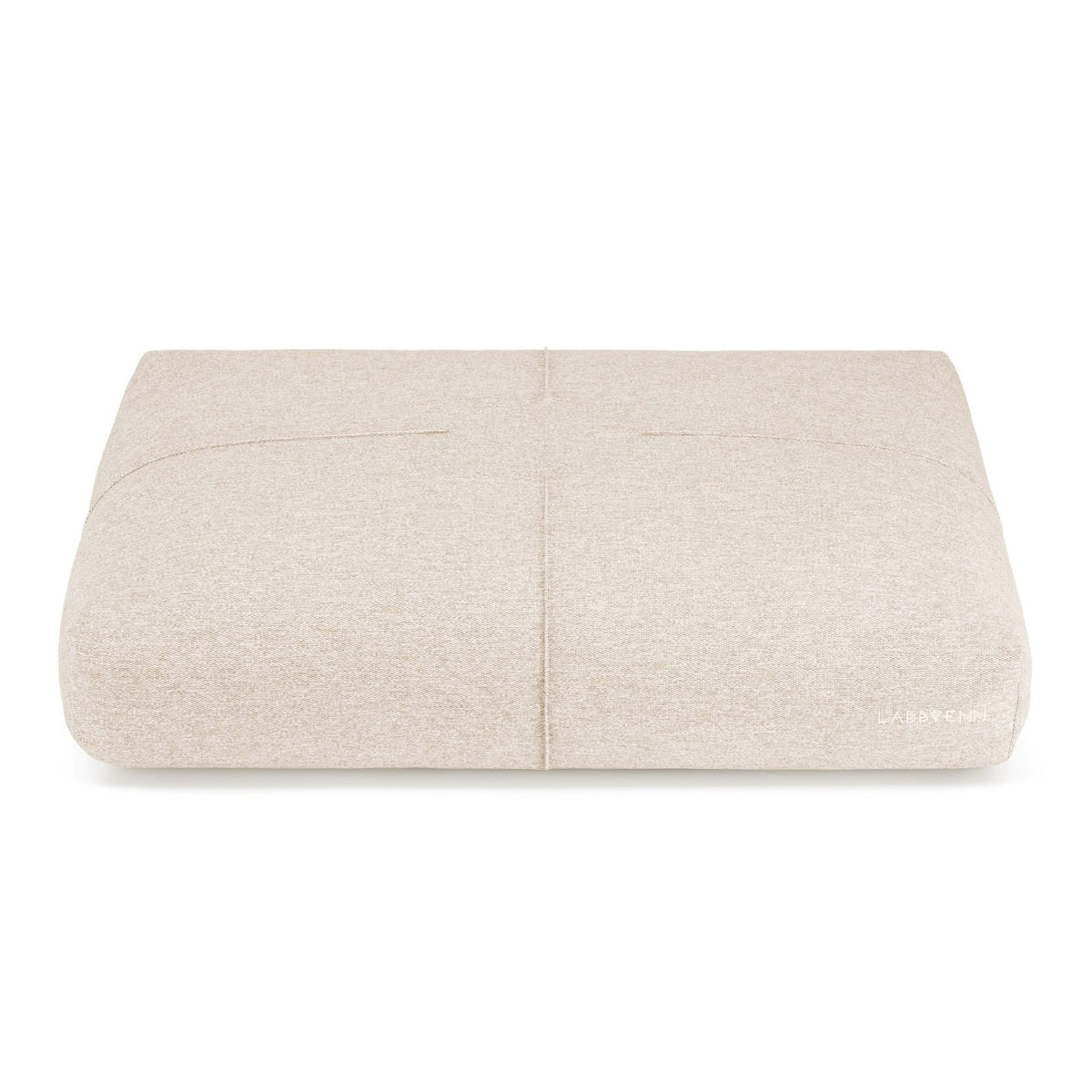 2. Beige Finno dog cushion by Labbvenn with decorative stitching, shown on a white background highlighting its elegant design and brand logo on the side.