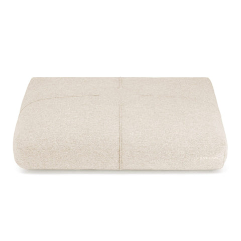 2. Beige Finno dog cushion by Labbvenn with decorative stitching, shown on a white background highlighting its elegant design and brand logo on the side.