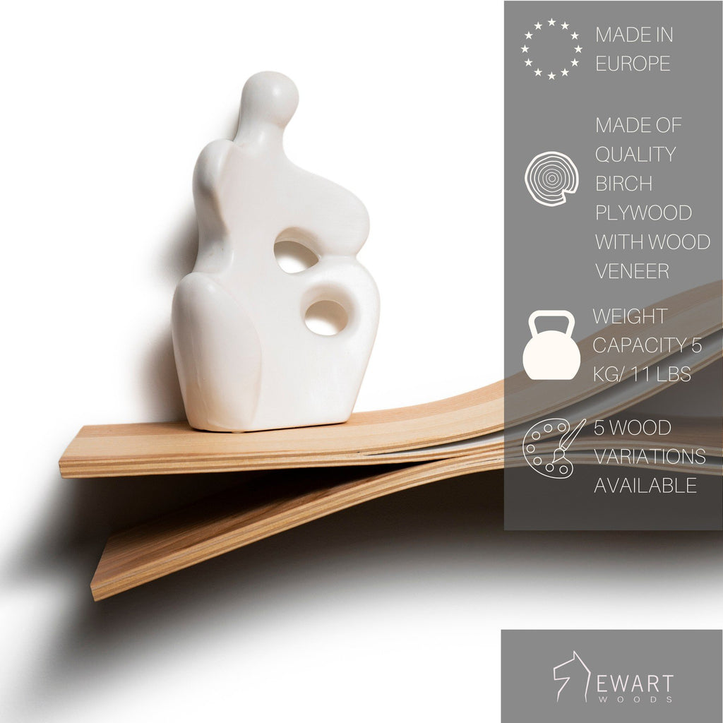 6. Close-up of floating shelf with abstract white sculpture and product features overlay