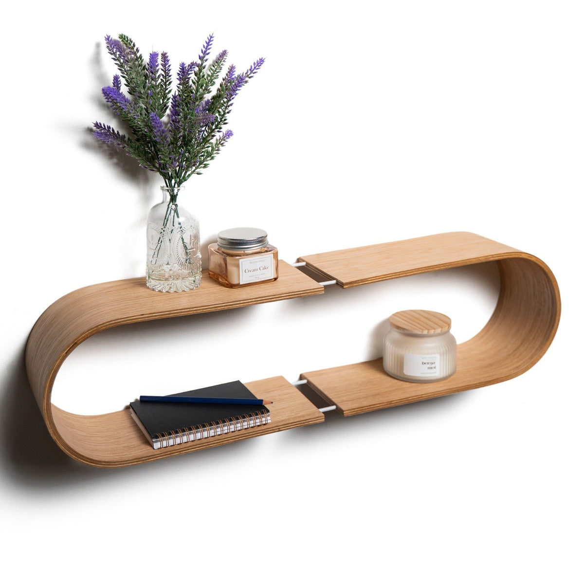 1. Oval wooden wall shelf with lavender and candles, styled for modern decor