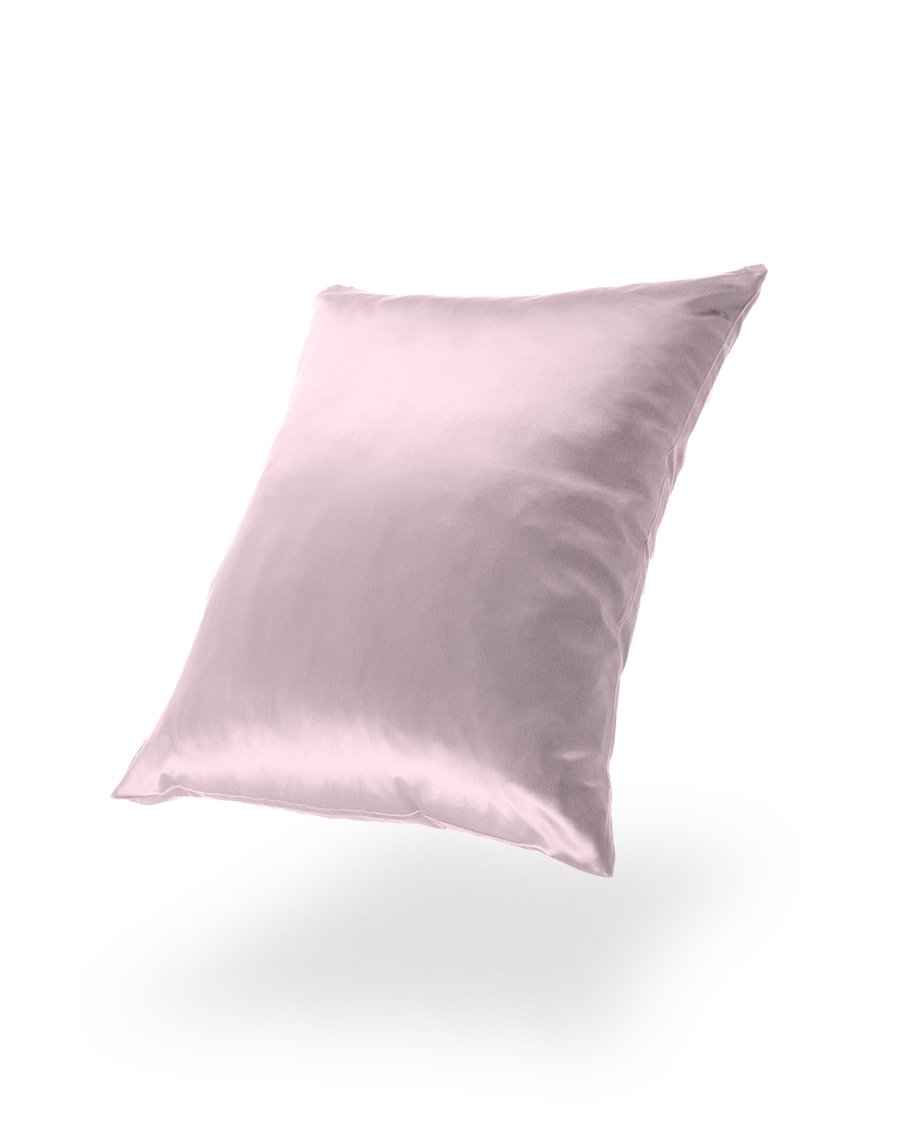 20. Pink silk pillowcase on black background, highlighting soft sheen