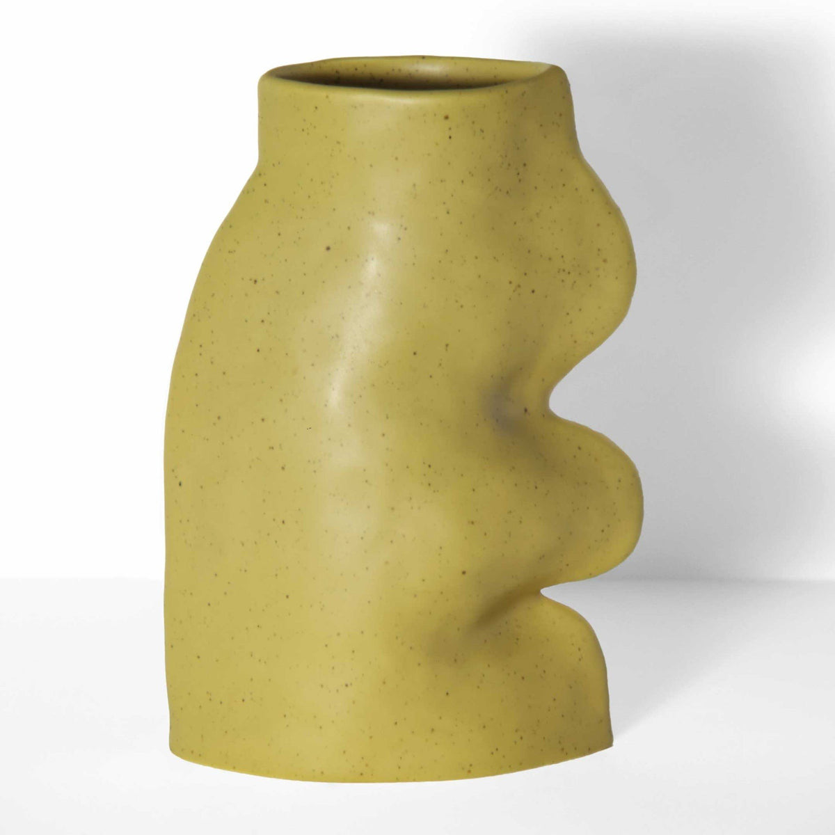 4. Studio shot of Fluxo Ceramic Vase Large in Pistachio by 5mm Paper, highlighting unique flowing design