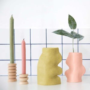 3. Fluxo Ceramic Vase Large in Pistachio by 5mm Paper, shown with pink vase and candles against tiled background
