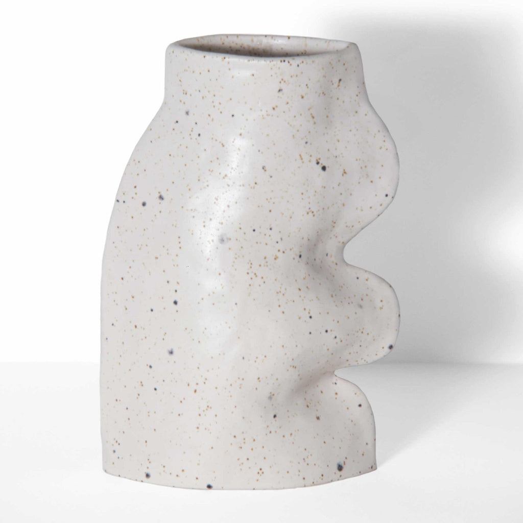4. Studio shot of the Fluxo Ceramic Vase in white by 5mm Paper, highlighting its handcrafted flowing design