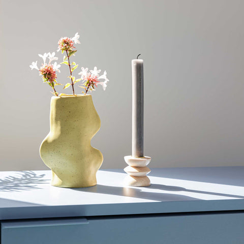 1. Fluxo Ceramic Vase in Pistachio by 5mm Paper, styled with flowers and candle on a table