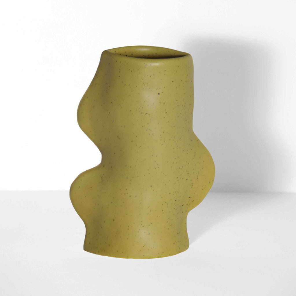 5. Studio shot of Fluxo Ceramic Vase in Pistachio, highlighting unique flowing lines and craftsmanship