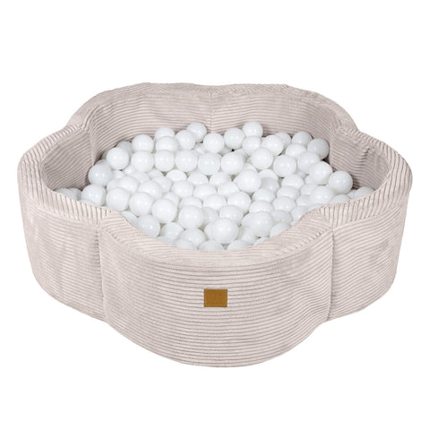 1. Ecru flower-shaped foam baby ball pit filled with white balls, featuring ribbed texture and brown brand patch, ideal for indoor play