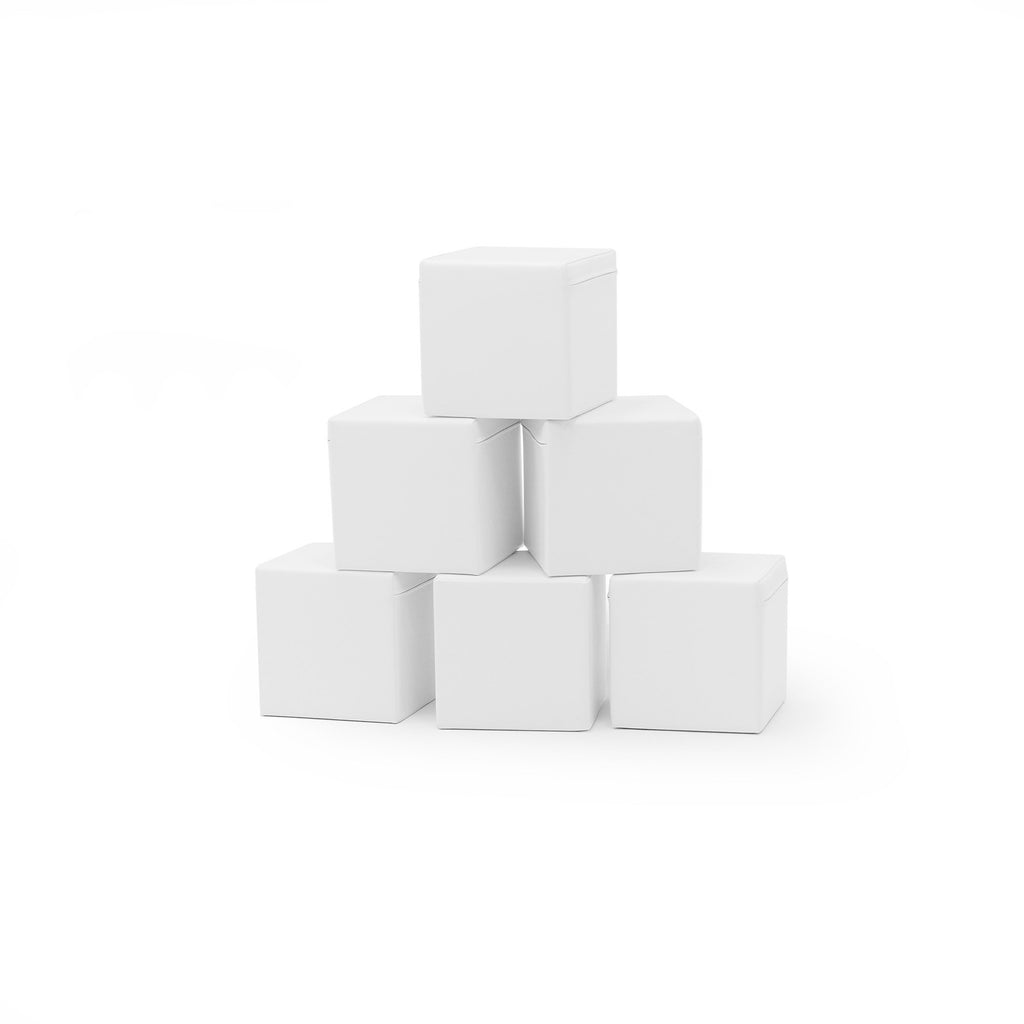 4. Set of six white foam building blocks stacked in a pyramid on a white background