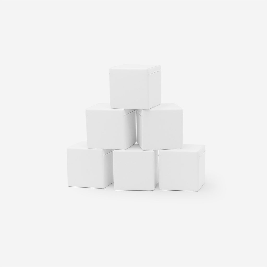 3. Set of six white foam building blocks stacked in a pyramid on a white background