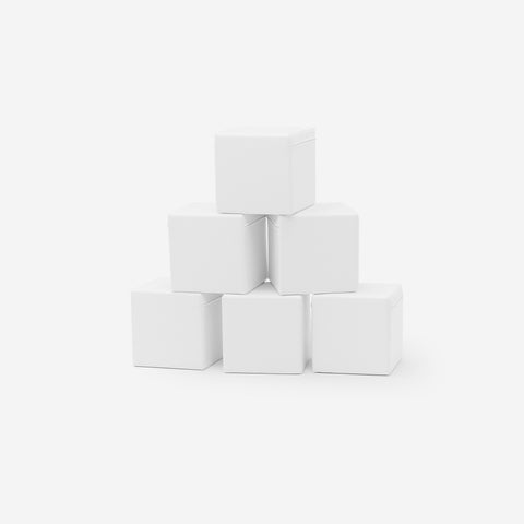 3. Set of six white foam building blocks stacked in a pyramid on a white background