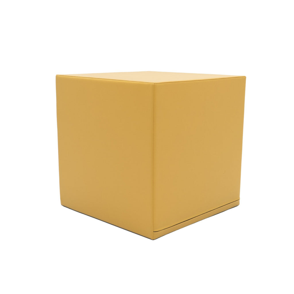 2. Side view of honey-colored foam mega cube building block by IGLU on a white background