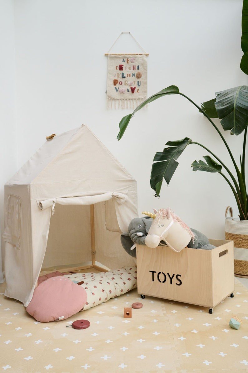 9. Play tent and toy box on OLYA KIDS Cross sand foam puzzle playmat in bright playroom