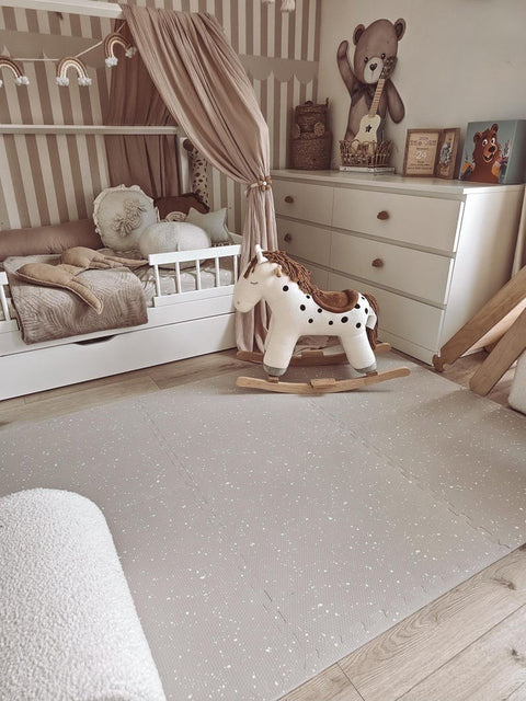 4. Nursery with cappuccino foam puzzle playmat, white crib, and plush rocking horse
