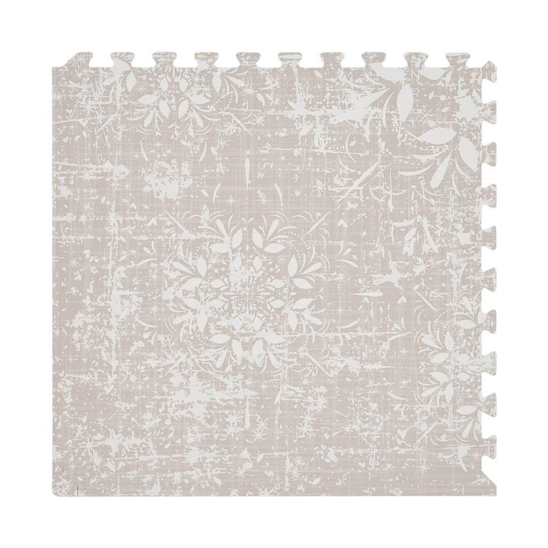 3. Close-up of single piece of vintage beige foam puzzle playmat with intricate floral pattern