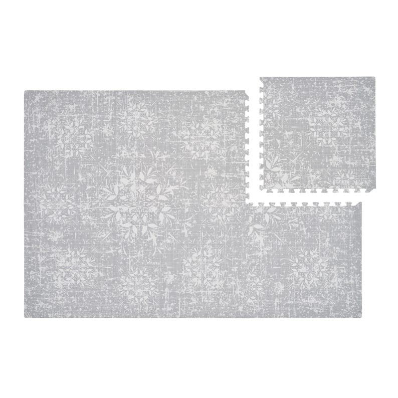 7. Two pieces of OLYA KIDS vintage grey foam puzzle playmat with Persian rug-inspired design on white background