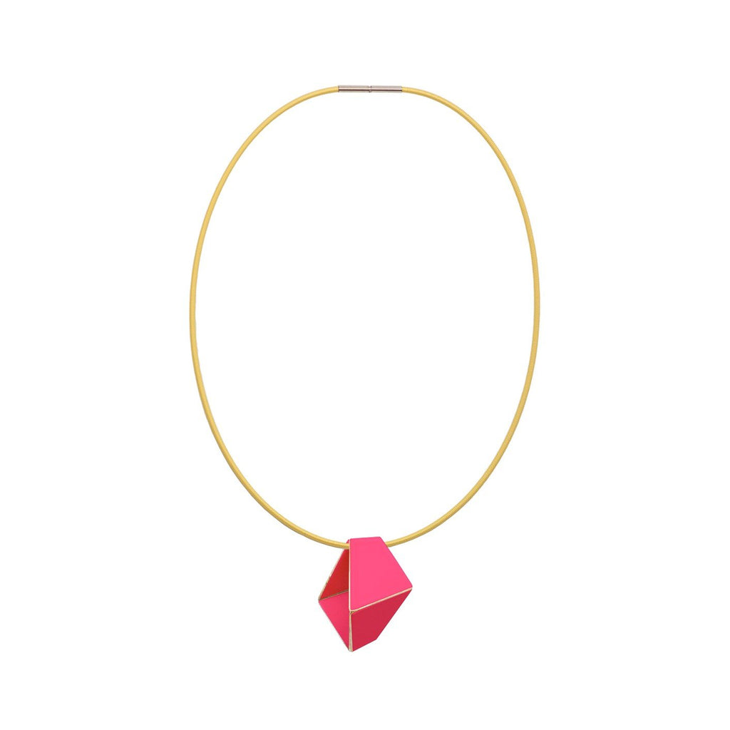 4. Studio image of Lisa Kroeber Jewellery Folded Necklace in magenta, showcasing geometric pendant on brass chain