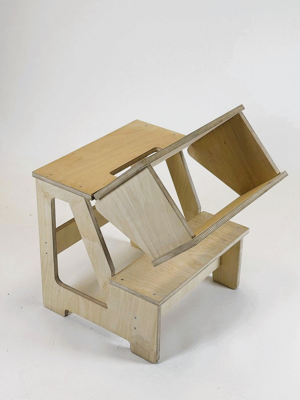 2. Wooden folding seat and climbing helper in studio setting with partially folded backrest