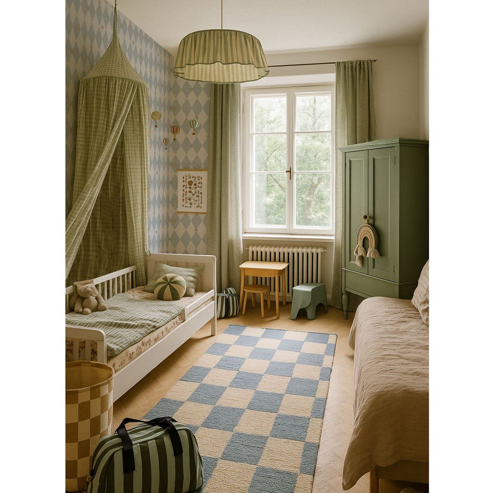 1. Children's room with Dekornik wallpaper featuring blue diamonds and yellow stars, green canopy, and checkered rug