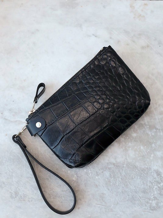 7. Black alligator leather POUCH wallet with wrist strap on light surface