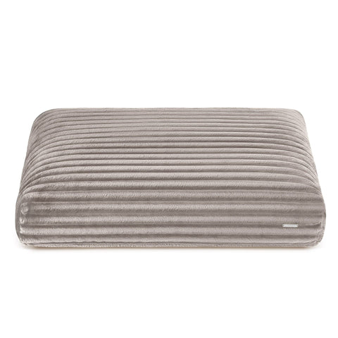 2. Beige ribbed dog cushion by Labbvenn on white background, showcasing plush texture and elegant design