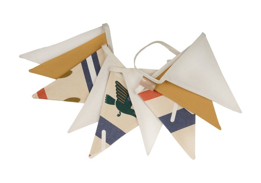 6. Studio shot of folded Moi Mili Native Vibe garland with geometric and mustard yellow pennants