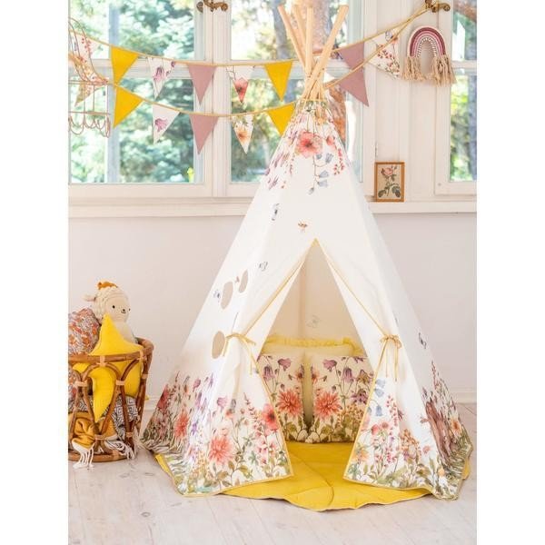 1. Children's room with a teepee tent and floral and solid color garland hanging above, featuring yellow and pink pendants