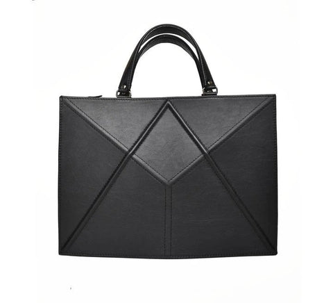 1. Gerda Retter Design FACET black handbag in quality Spanish leather, front view showing geometric pattern