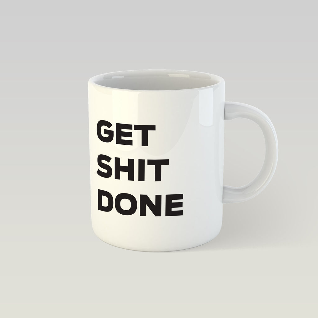 2. SEIK Design Mug with 'GET SHIT DONE' text, studio shot highlighting white ceramic and bold typography