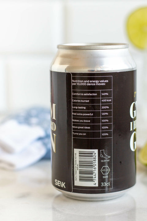 3. Close-up of SEIK 'Gym I Heard Gin' can showing humorous nutrition facts, socks in background