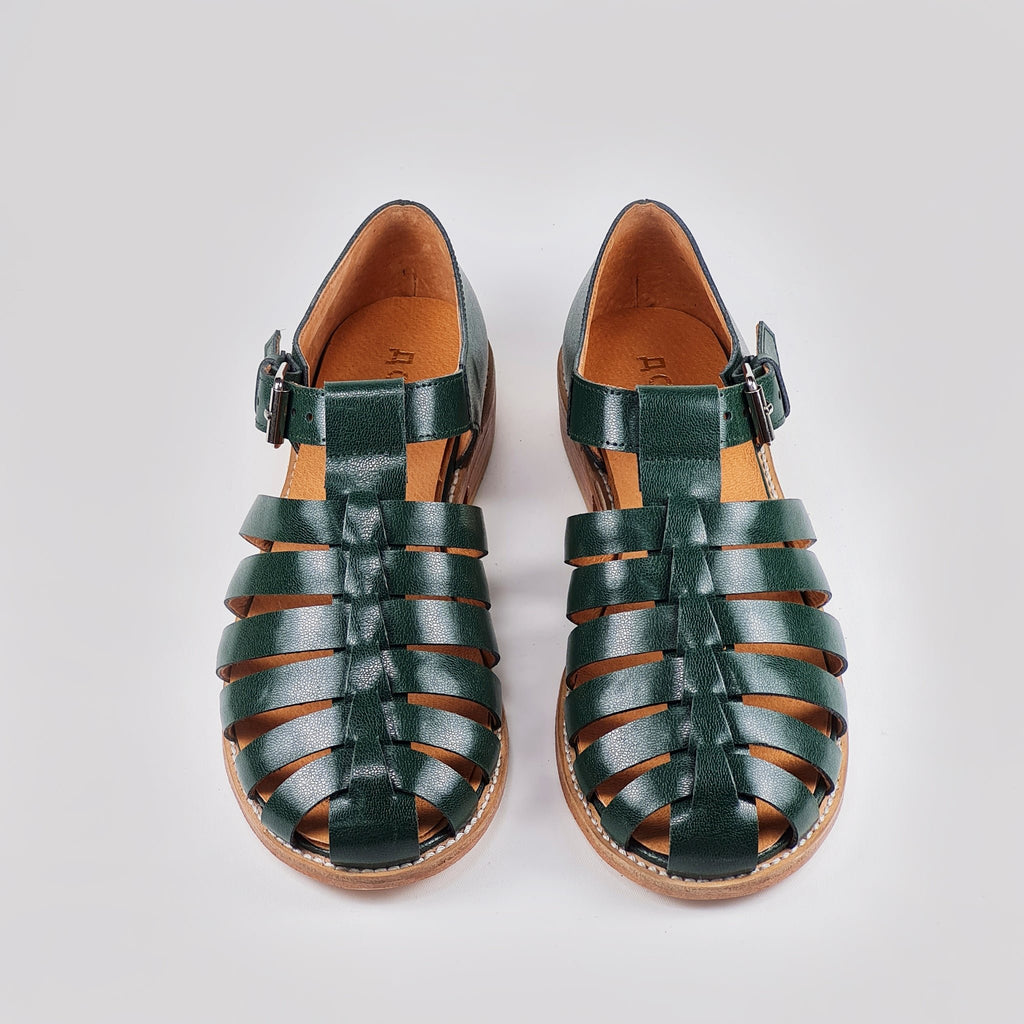 3. Studio shot of Daz Studio dark green leather fisherman sandals with strap-covered front and buckle