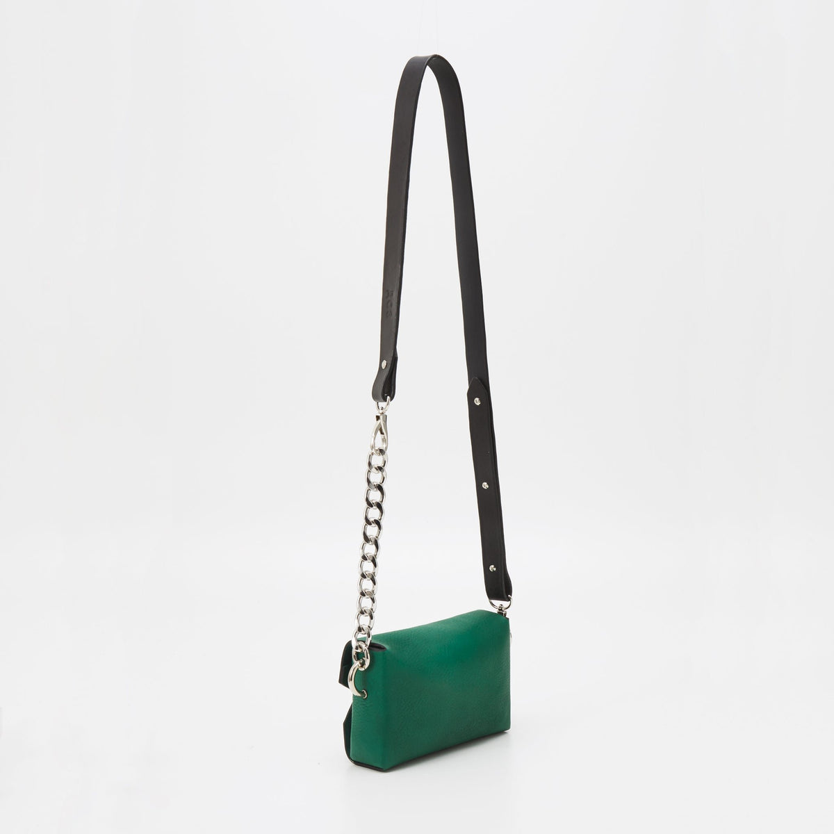 4. Studio shot of Daz Studio green leather envelope bag with adjustable black strap and chain