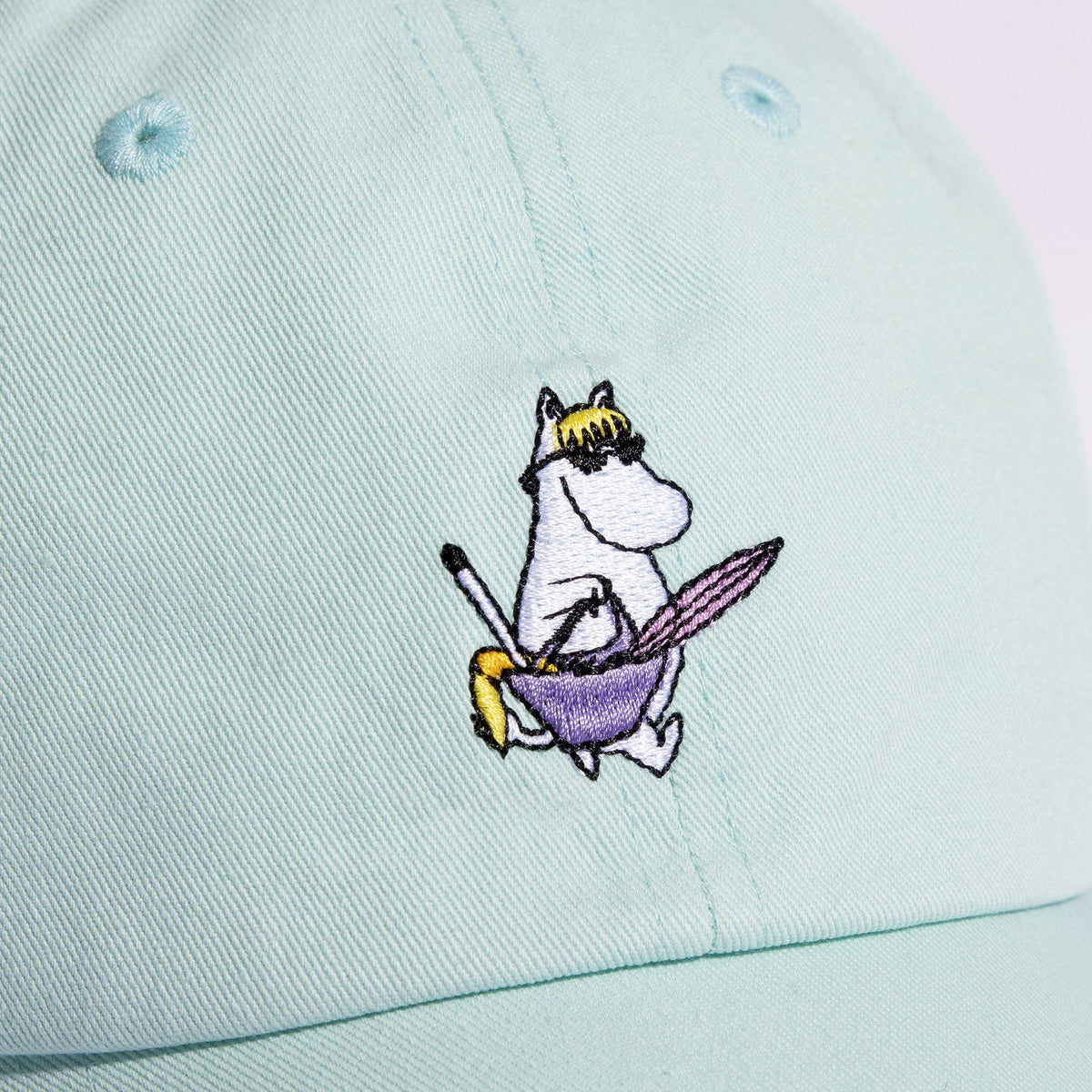 4. Close-up of Snorkmaiden embroidery on mint cotton Dad Cap by Moomin