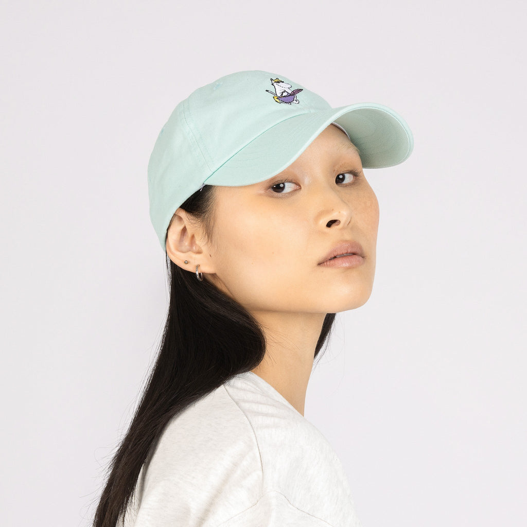 1. Women's Snorkmaiden Dad Cap in mint by Moomin, worn by model in studio