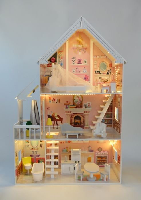 2. Gerardo's Toys wooden dollhouse with LED lights, three floors, and terrace, shown with illuminated rooms and detailed interior