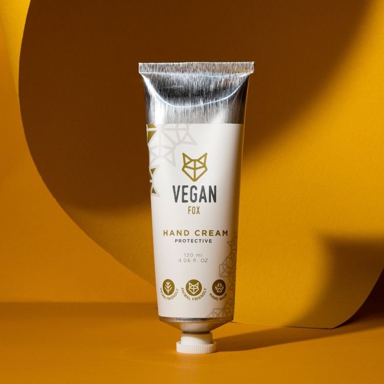 2. Vegan Fox Protective Hand Cream, 120 ml, with packaging, styled with green leaves on a pastel background