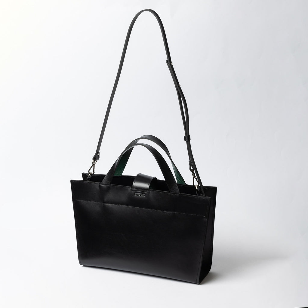 1. Black leather MONIKA tote bag with adjustable strap on white background