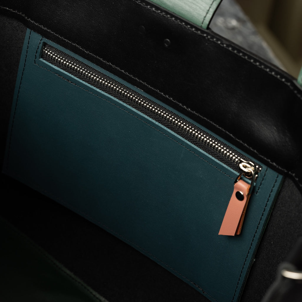 8. Interior view of MONIKA tote bag showing zippered pocket