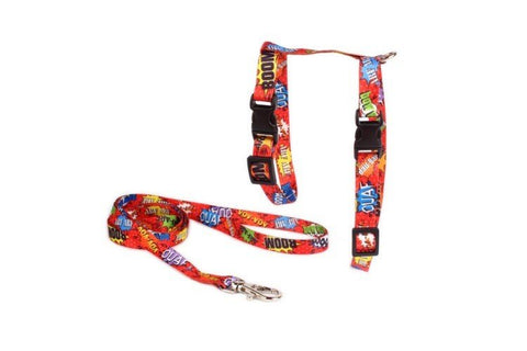 2. Red graffiti-patterned cat harness and leash set by Matteo, featuring colorful text design and black buckles, shown on a white background
