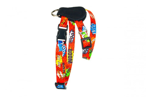 2. Red graffiti dog harness with leather accents and colorful comic-style text, featuring black plastic buckle and nickel-plated ring, displayed on a white background.