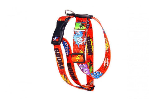 1. Red graffiti-patterned dog harness with black plastic buckle and nickel-plated hardware, featuring colorful comic-style text and genuine leather accents, shown on a white background.