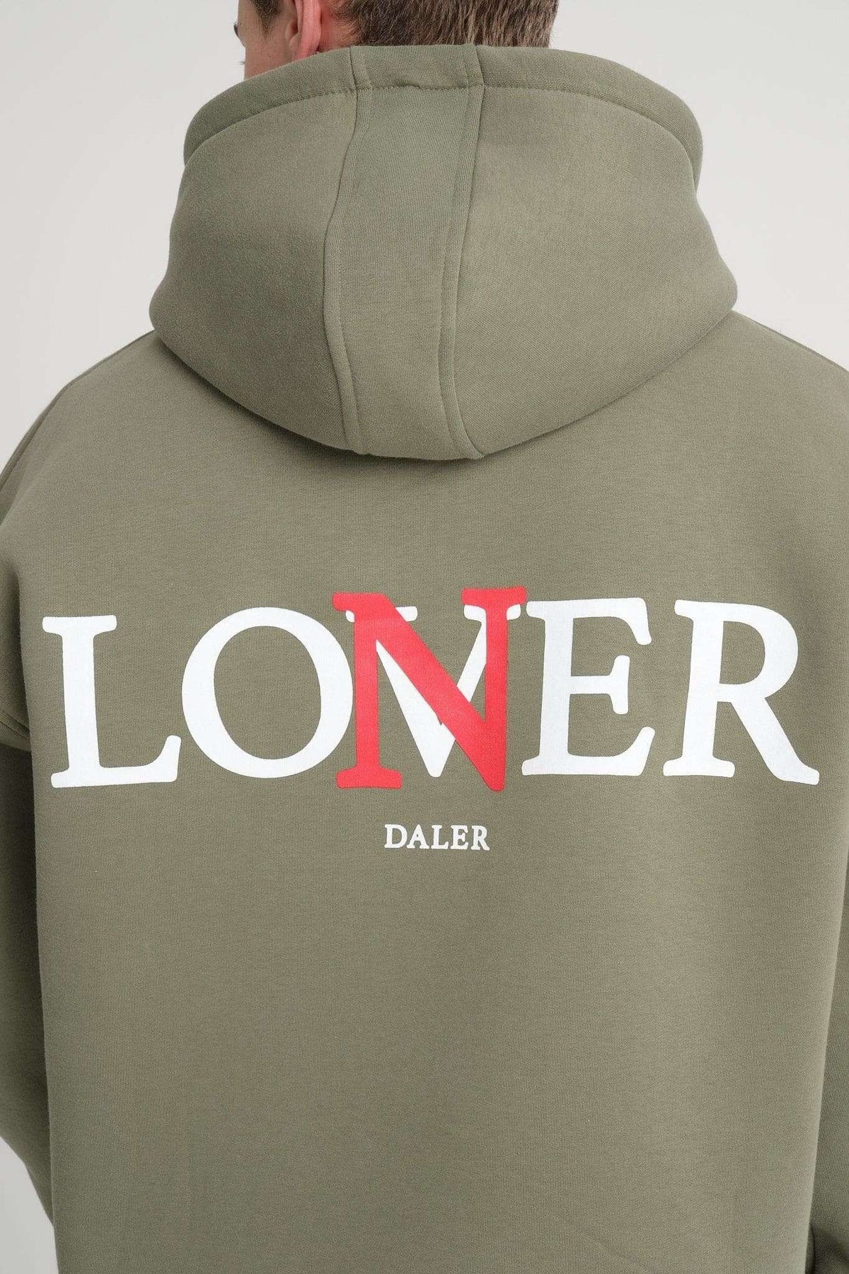 2. Back view of men's olive green hoodie with hood up, featuring 'LONER' and 'DALER' print